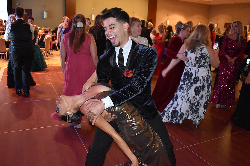 Dancers Francis Llorente and Zoe Luna, representing Fred Astaire Studios Sarasota, entertained the crowd.