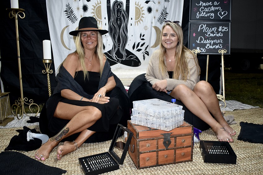 Heidi Wiegert and Sydney Duchow of Sacred Goddess Custom Fit Toe Rings, a local vendor, sold toe rings and ankle bracelets.