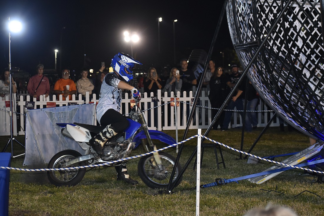 Sarasota's Tyler Burke ("Turbo Tyler") enters the Globe of Death during the 2024 edition of Thunder by the Bay