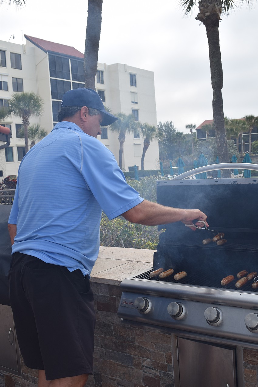 John Berg grilling at the Seaplace Pancake breakfast.