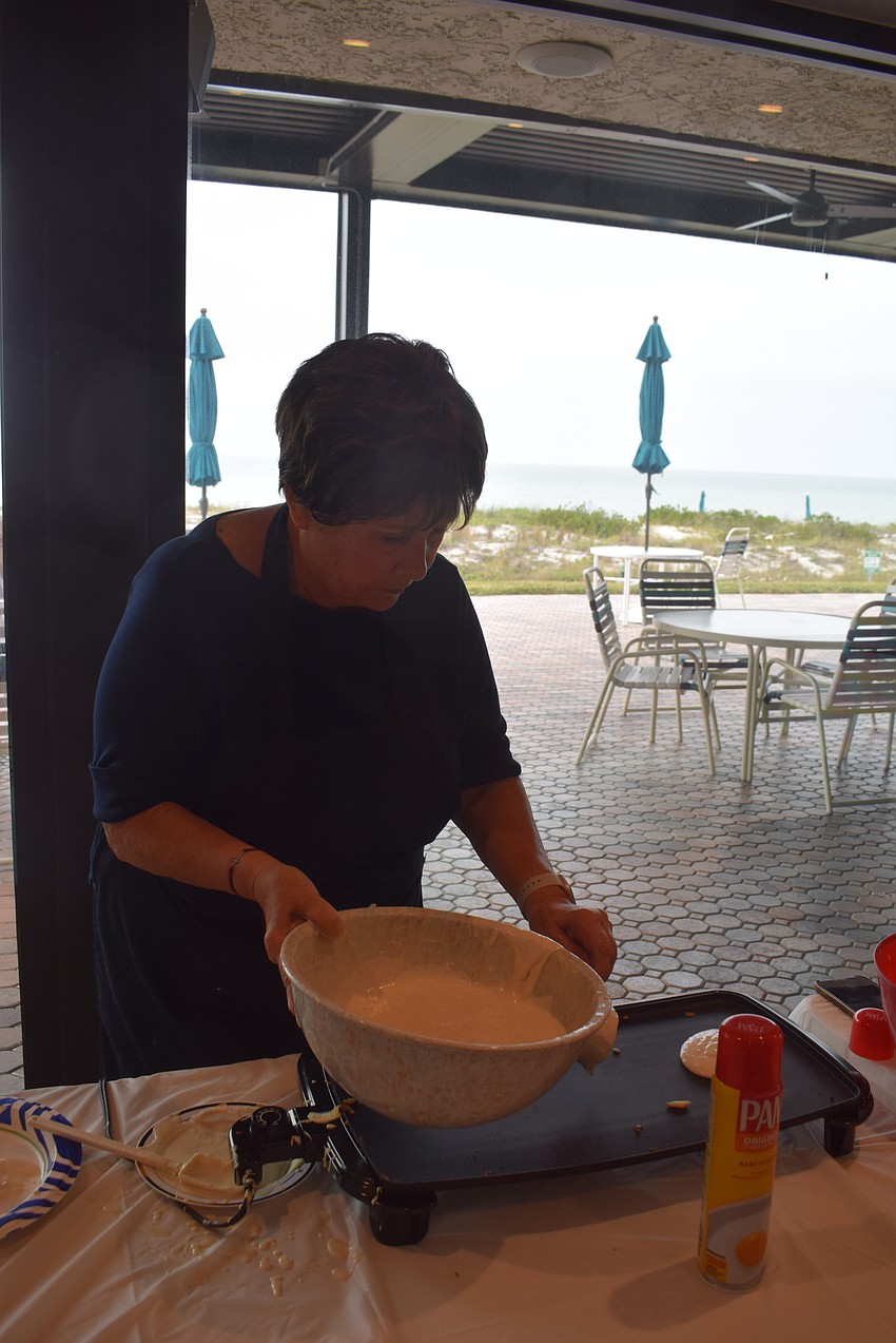 Debbie Andy making pancakes at the Seaplace pancake breakfast.