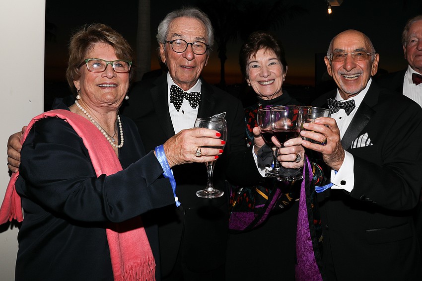 Fran Lambert, Sy Ziegelman, Marie Monsky and Marvin Kadesh toast the Sarasota Orchestra