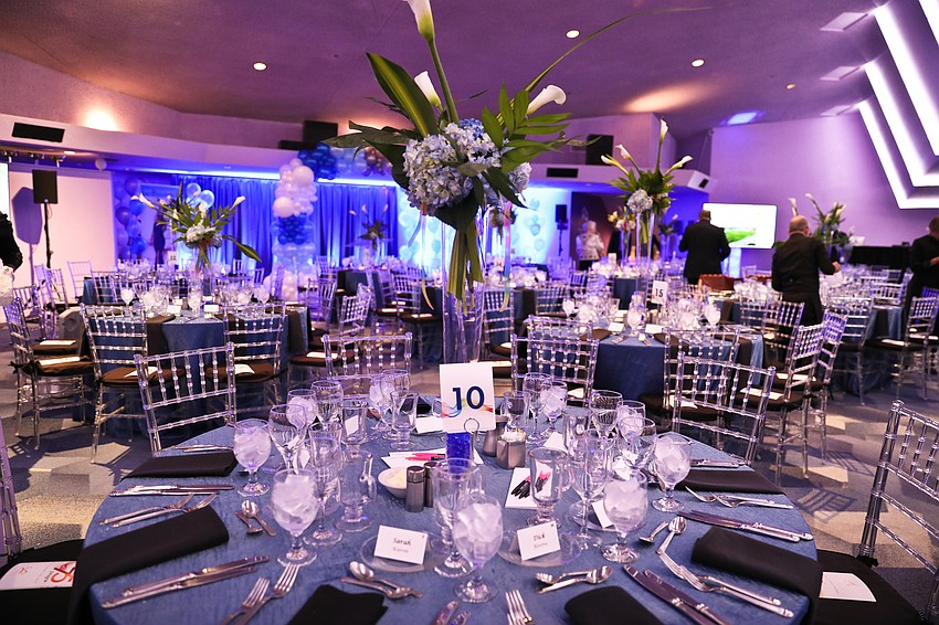 The Van Wezel event area was transformed into a magical garden of blue with complimenting centerpieces from Suncoast Flowers