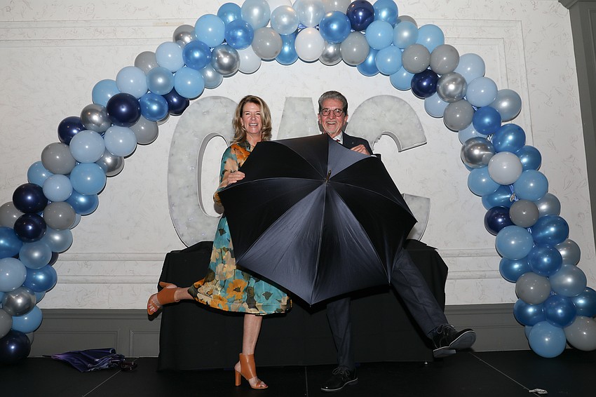 Elizabeth Moore and Bob Bunting with their climate umbrella