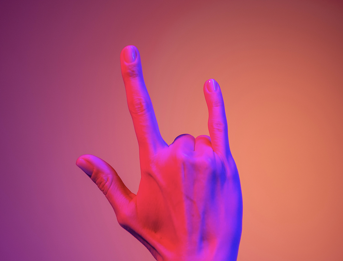 A lesson in sign language. Photo by cottonbro studio: https://www.pexels.com/photo/persons-hand-doing-peace-sign-4629630/