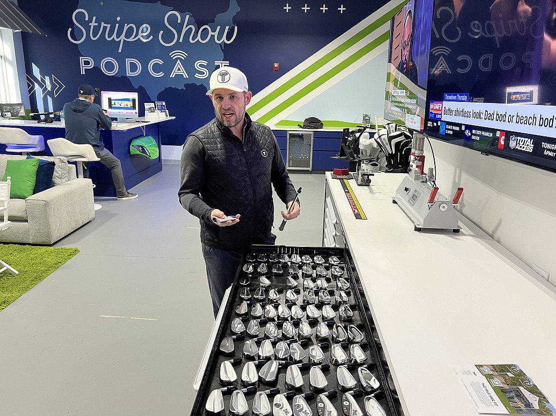 True Spec master golf club fitter Clay Joiner pulls out one of several drawers filled with familiar name-brand club heads to be fitted on a variety of shafts.