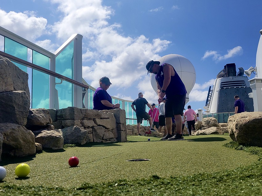 Chelsea Brown and Freddie Vincenti hit the mini golf course.