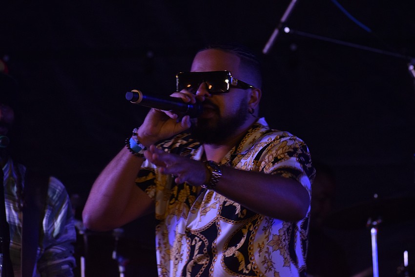 Paul Anthony of Paul Anthony & The Reggae Souljahs performs.