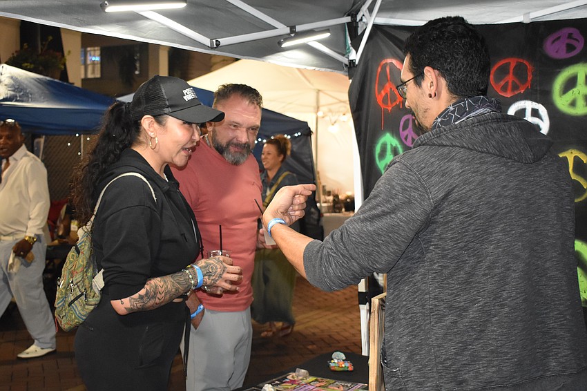 Dave and Via Karshick discover the pendants at Blunteez with the help of Johnny Pedri.