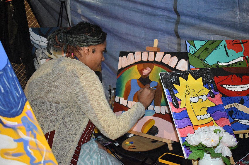 Sarasota artist Eliza Seabrook of Eliza DaVinci created paintings during the festival.