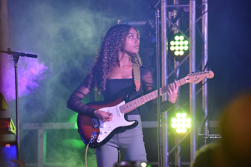 Jordan Bullard, 16, performs at the event.