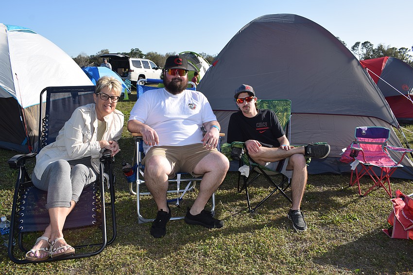 Lakewood Ranch's Lissa Nugent, Connor Nugent and Dylan Glover use the Community Campout as an opportunity to introduce children to camping.