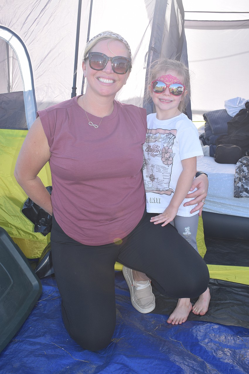First-time campers Leigh Sierra and her 4-year-old daughter Weslyn Sierra, of Harmony, look forward to the nature walk.