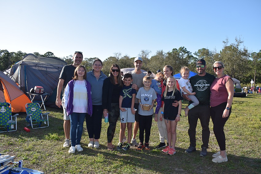 The McDermott family, Caiano family, Reed family and Sierra family, who all are neighbors in Harmony, participate in the Community Campout to have a new experience together.