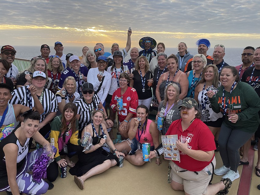 MVP Sports and Social members represent their favorite teams during the Super Bowl watch party.