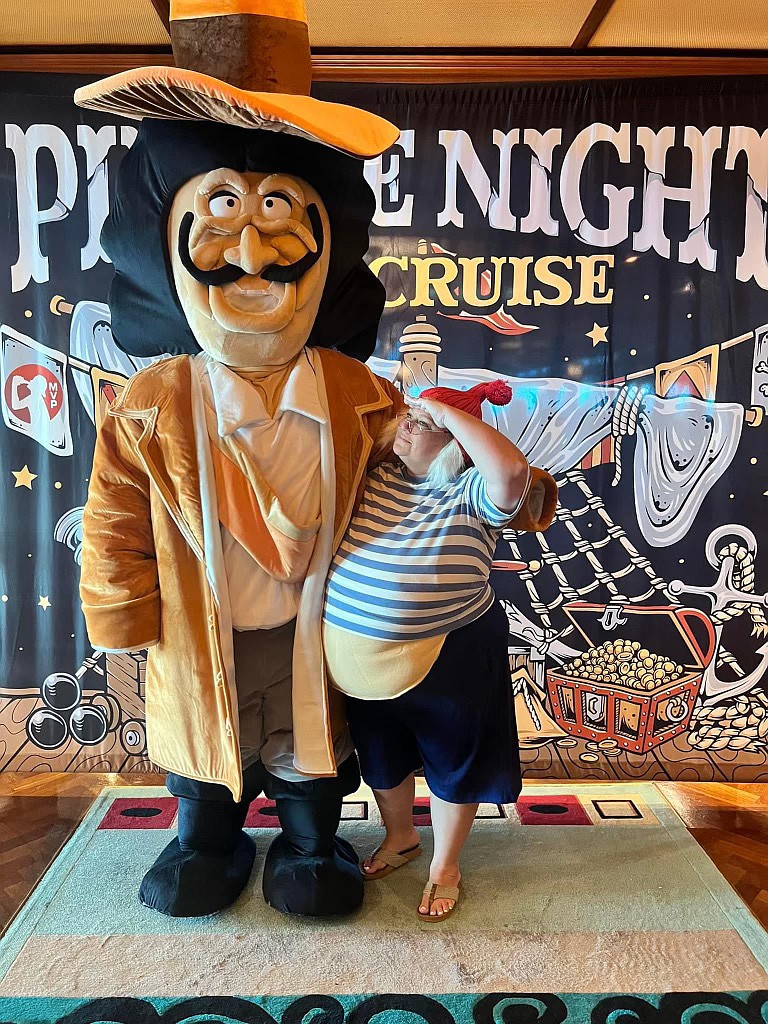 Chris McComas and his wife, Jessi McComas, who are the founders of MVP Sports and Social, take the pirate costume contest to the next level.