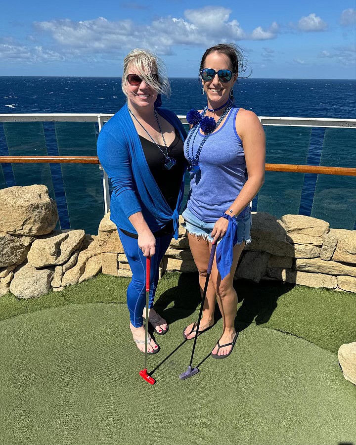 Andrea Ohmes and Kristina Calvin play mini golf together on the cruise. The different activities gave members an opportunity to create new friendships and make deeper connections with those they already knew.