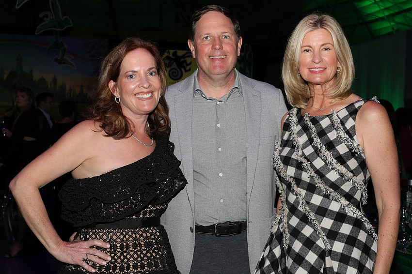 Retta and John Wagner with Brenda Michel