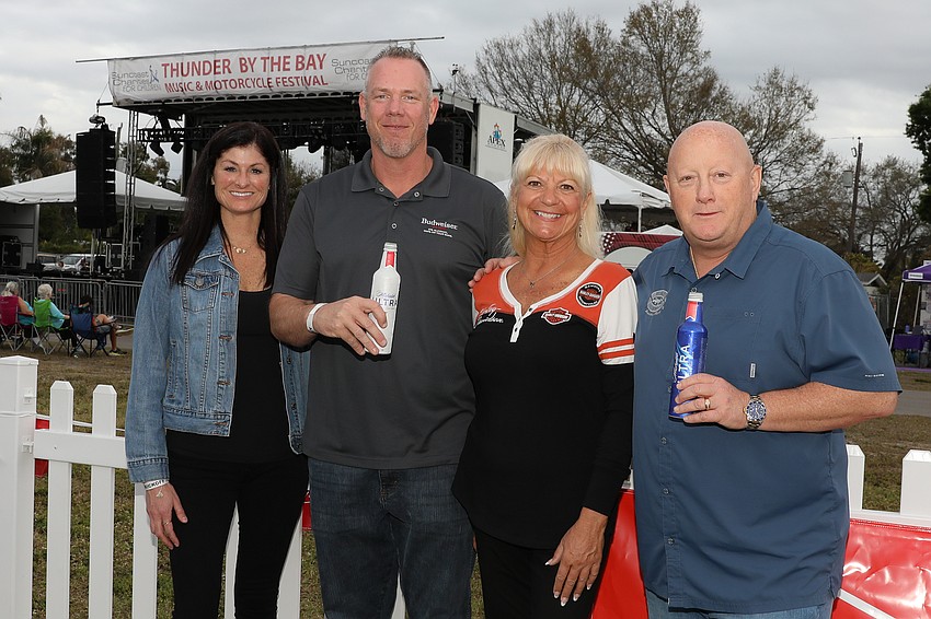 Robin Knoll, Chad Fraser, Suncoast Charities for Children Executive Director Lucy Nicandri and Pat Bruenning
