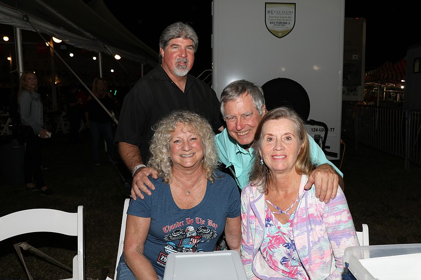 Thunder by the Bay volunteers in the VIP tent include Helen and Jim Reed, and Marie and Herb Hadden