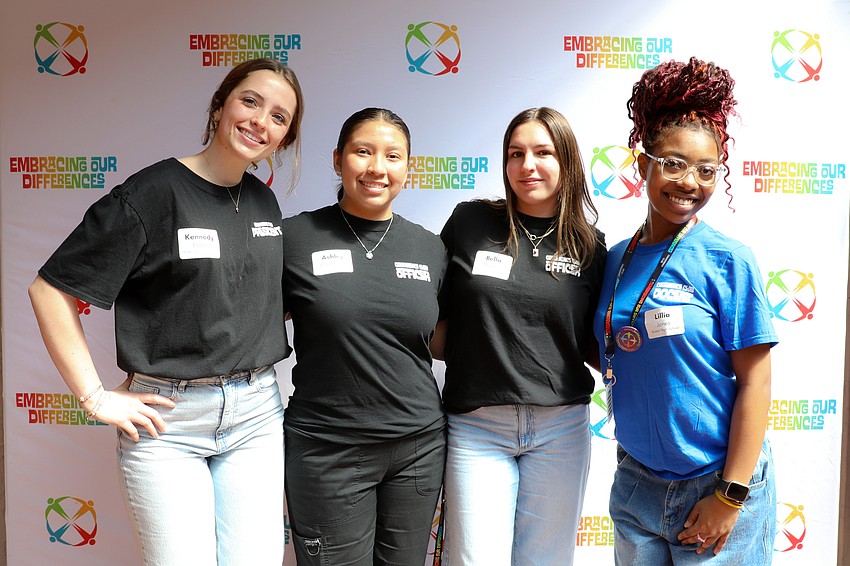 High school Co-Existence Club docents are students Kennedy Flatch, Ashley Rosas-Rios, Isabella Munera and Lillia Jones
