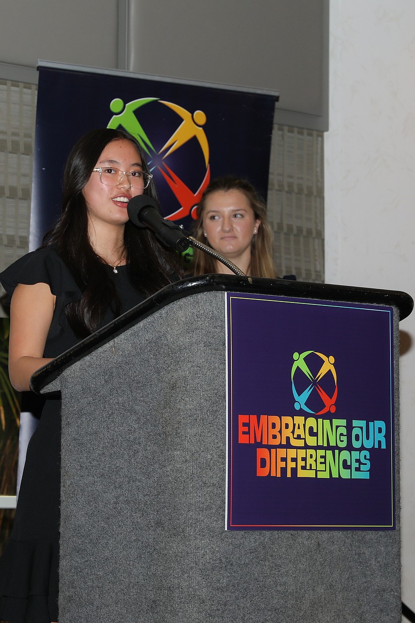 Student Speaker Melora Saing from Sarasota High School speaks to guests about how learning to read bolstered her confidence.