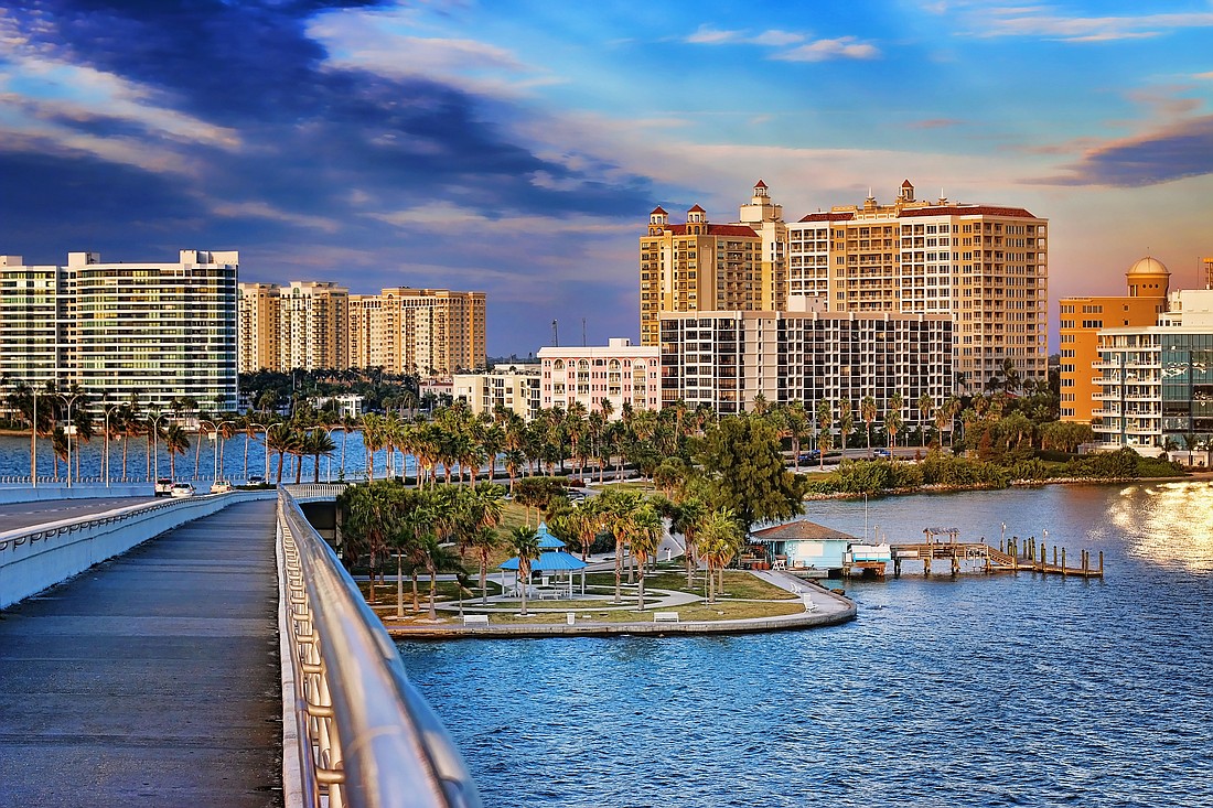The gleaming towers of downtown Sarasota as viewed from the Ringling Bridge provide a backdrop for a variety of date-night options.
