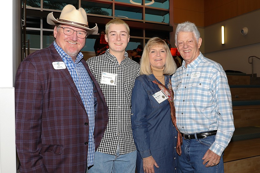 Board of Trustee member Mike Fuller, his son, Remmington, SCF President Carol Probstfeld, and her husband and SCF Ambassador, Bill Murphy