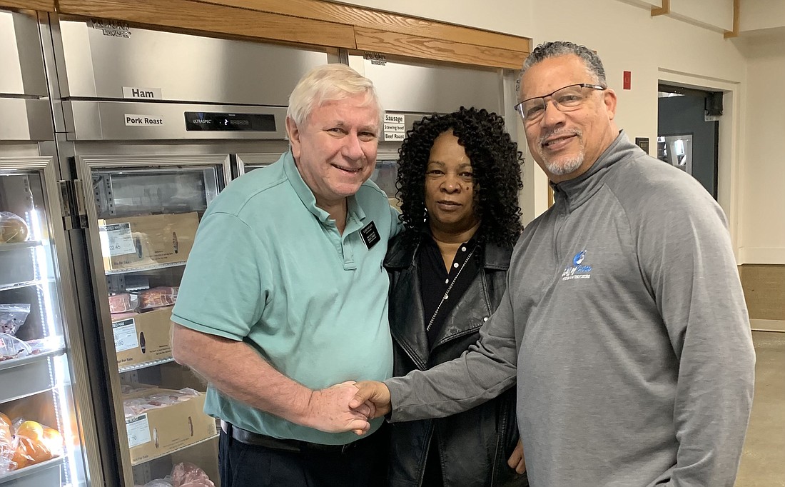 Elder Portlock, service missionary and manager of the Bishops’ Storehouse, took Christine and Michael Hopewell, pastors of New Water Church and ministers at the Well of Hope Food Bank, on a tour.