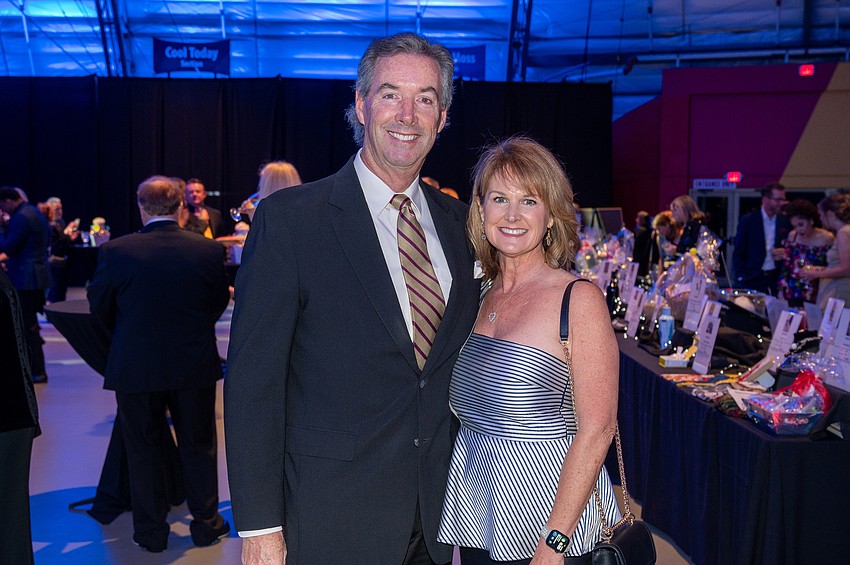 Event emcee Ray Collins and Erin Collins