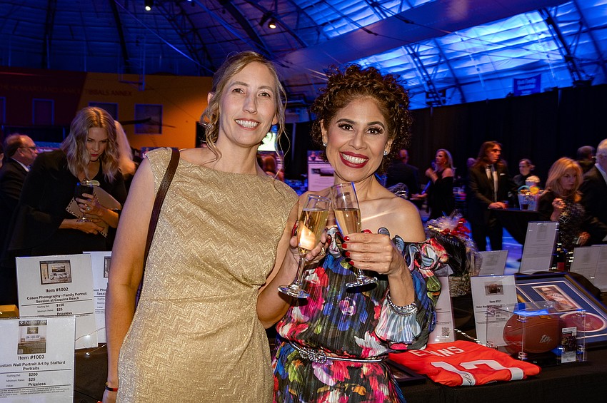 At the 2024 gala, friends Erica Molinar and Jessica Mendez cheers to Mendez's good health and the much needed financial support she received from the Florida Cancer Specialists Foundation after being diagnosed with ovarian cancer in 2022.