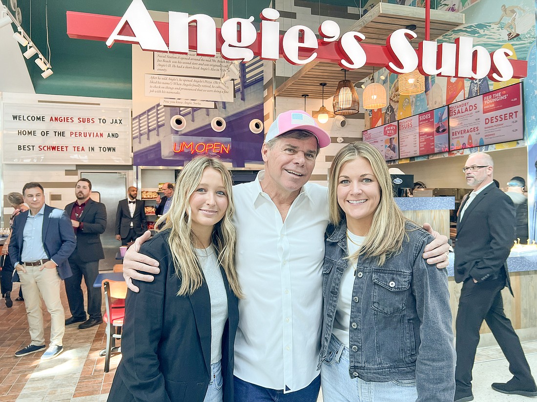 Owner Ed Malin entered a licensing agreement to open Angie's Subs at the airport. He is flanked by Kam Nix, general manager at Angie's in Jacksonville Beach and Kelly Mullarkey, managing partner.