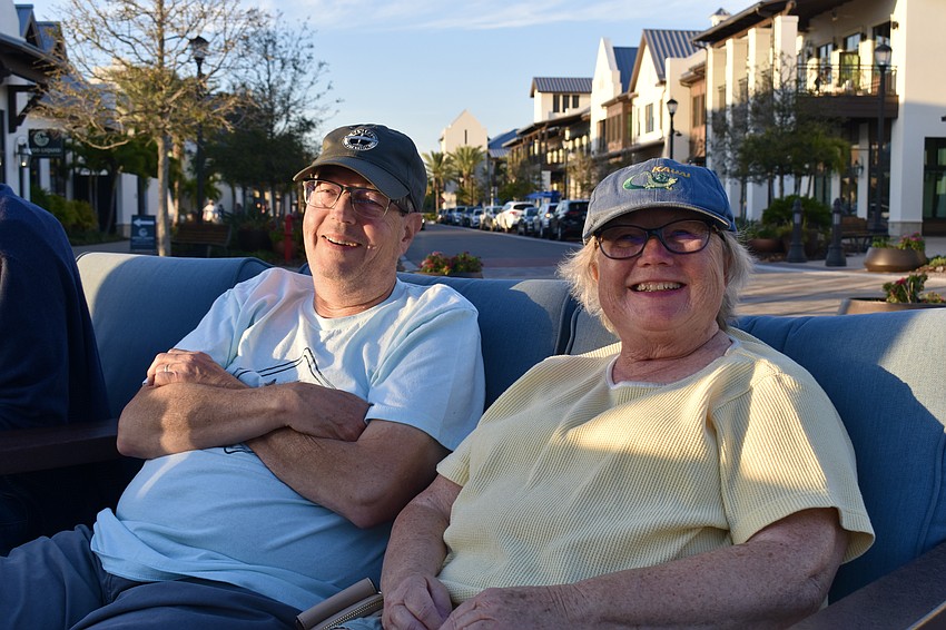 Bradenton residents Tim and Nancy Jarosik enjoy an evening out in Waterside Place after their granddaughter told them about Sights and Sounds.