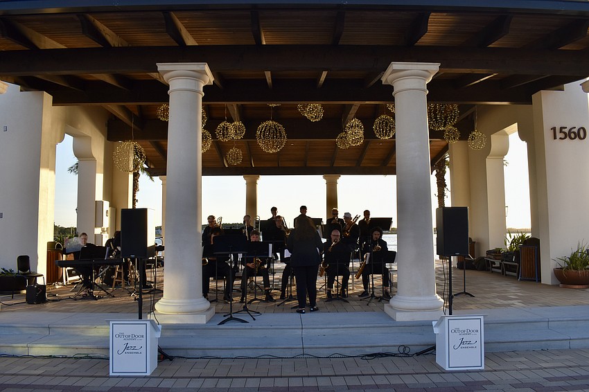 Students and faculty of the Out-of-Door Academy perform under the pavilion at Waterside Place on Feb. 27.