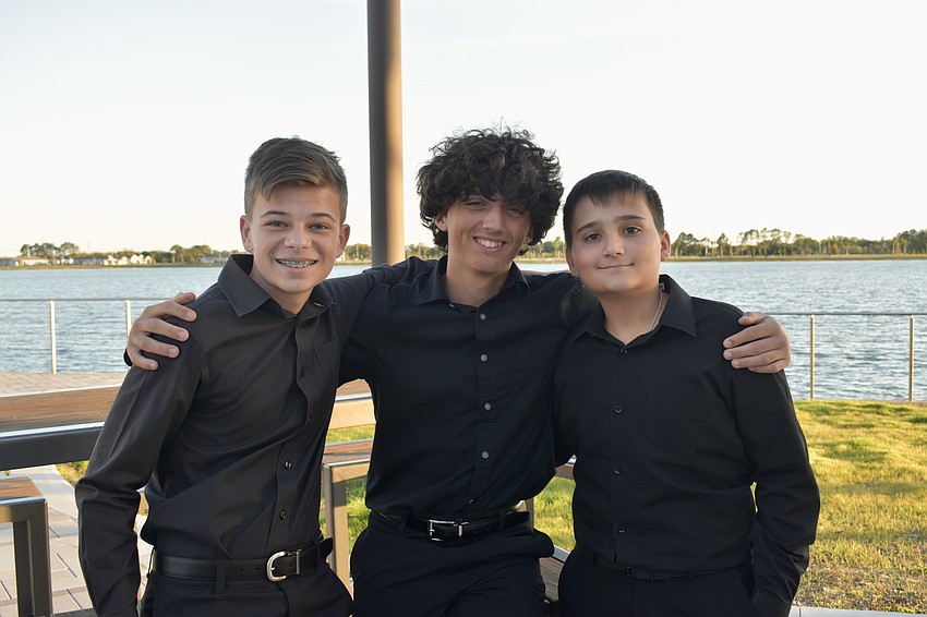Out-of-Door Academy freshmen Tom Bergerat, Brody Rose and Benja Garcia Argibay are members of the orchestra.