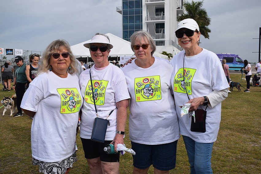 Palmetto's Kirsi Hiebert, Sara McKinney, Deb Frost and Rej Wilson join 12 others in their neighborhood to support Southeastern Guide Dogs.