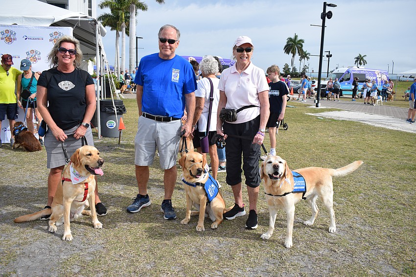 Parrish's Vicky Cox, Joe Cox and Betsy Walters and their dogs, Bubba, Sierra and Keni represent the different life stages of Southeastern Guide Dogs. Vicky Cox is with Bubba, who changed careers after serving with the nonprofit. Joe Cox is with Sierra, who is in training, and Walters is with Keni, an ambassador for the nonprofit.