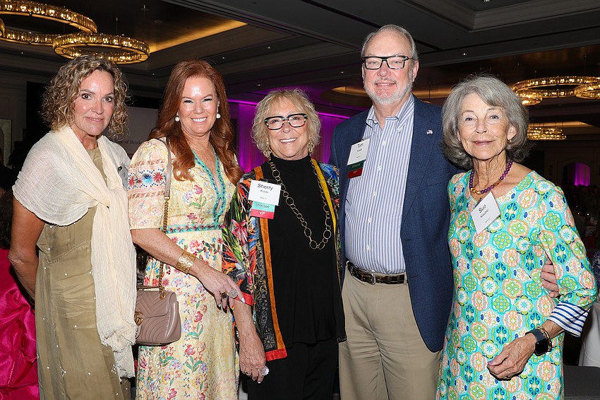 Lori Blaker, Terri Klauber, Sherry and Tom Koski, and Sue Klauber