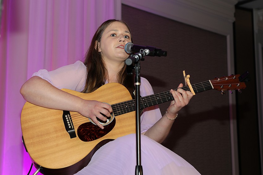 Empath Health Music Therapist Haley Verinder performs Maroon 5's hit song, Memories