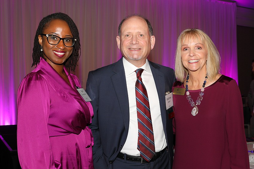 Nafi Cunningham with Tidewell Hospice, Matthew Mayper and Tidewell Foundation board member Jan Miller