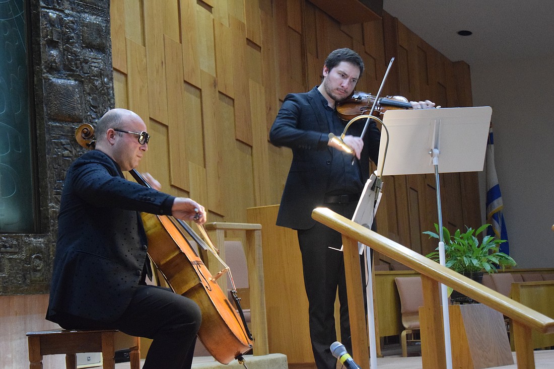 Cellist Steve Kramer and violinist Levi Mitze-Circiumaru