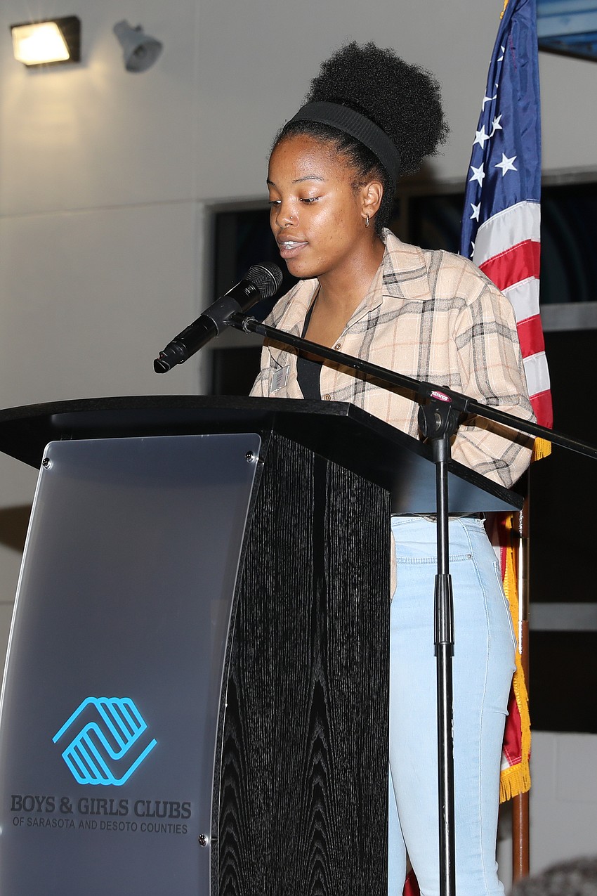 Mykayla G. addresses the guests.