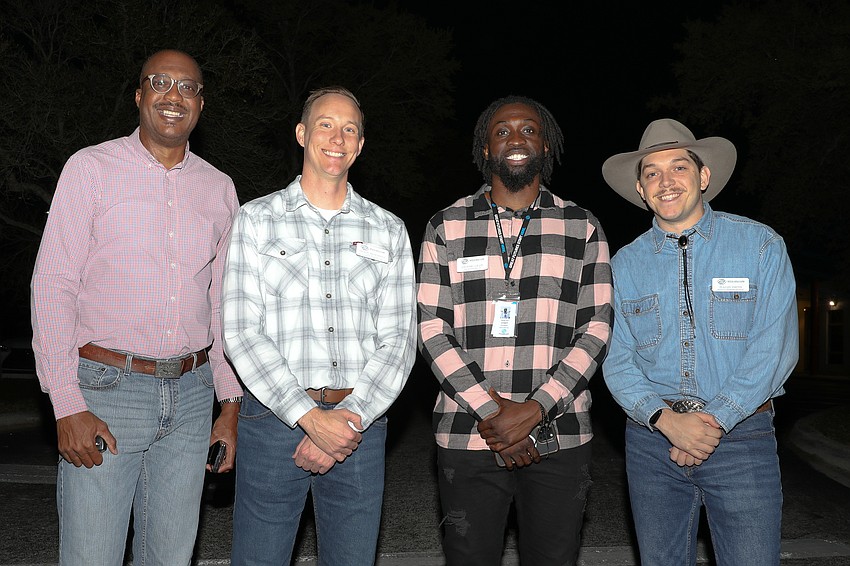Jarrish Jones, Travis McDowell, Geoffrey Gilot, and Isaiah Smith from Boys & Girls Clubs of Sarasota and DeSoto Counties greet guests.