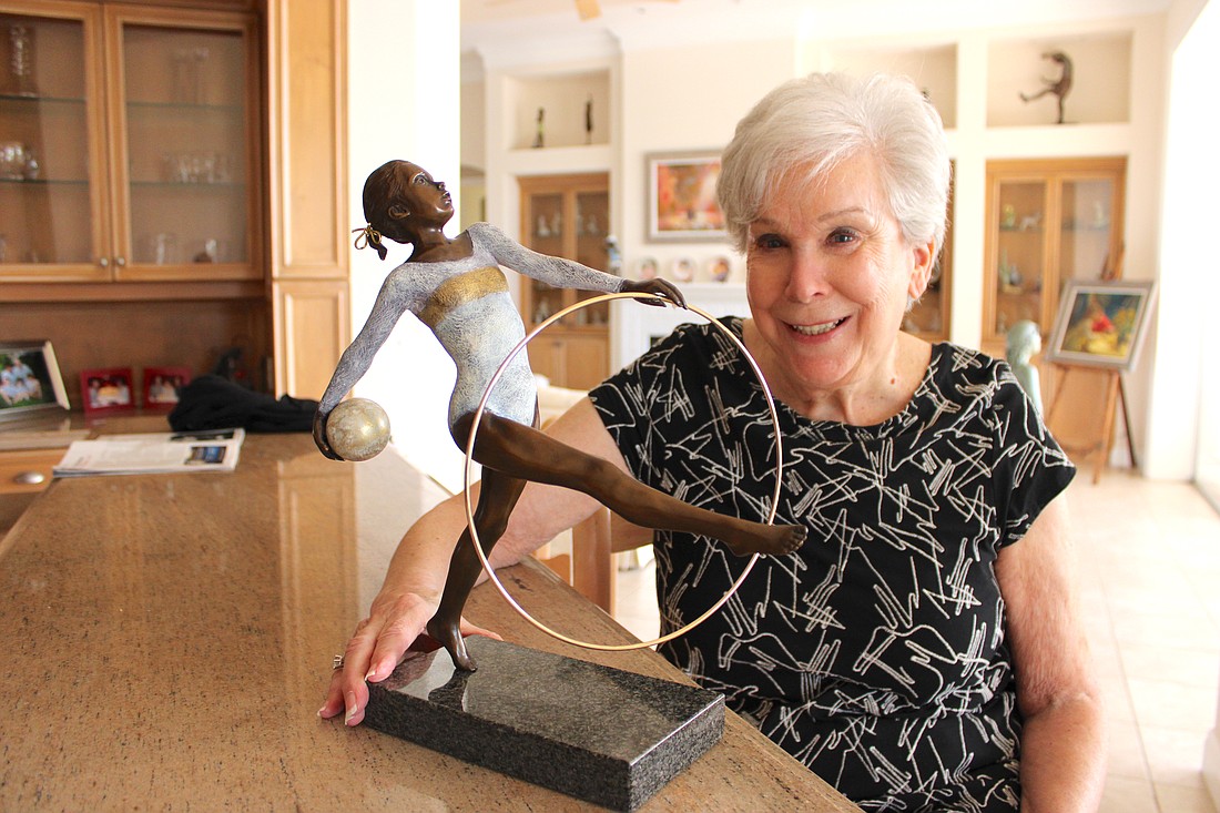 Marci Weisgold's sculpture "Rhythmic Gold" was Best in Show at the 2023 Art in the Park.