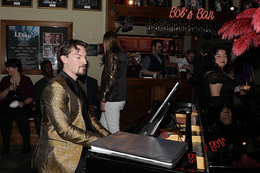 Jeremy Weinstein tickles the ivory during the cocktail hour.