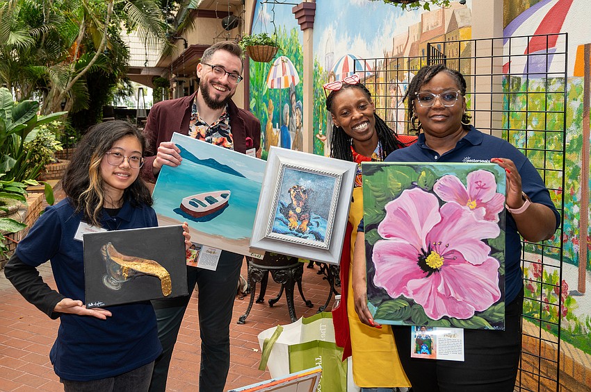 Isabella Martin, Chris Leverett, Renell Daniels and Latavia Davis show their artwork.