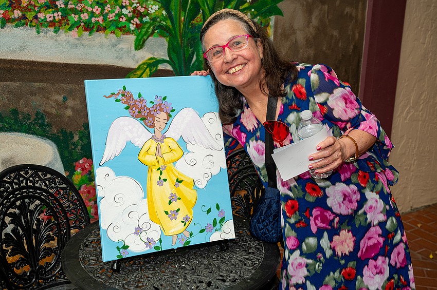 Anna L. with her artwork