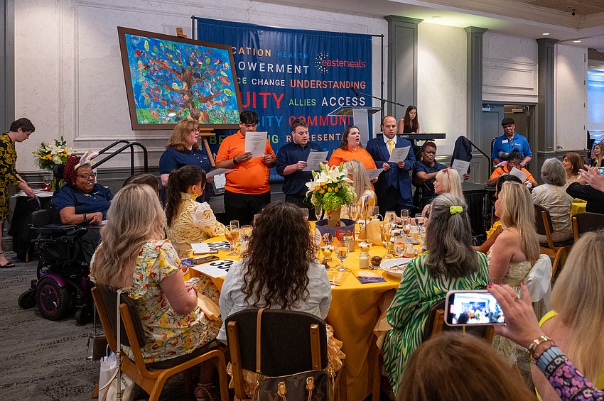 The Easterseals Family Singers sing for attendees.