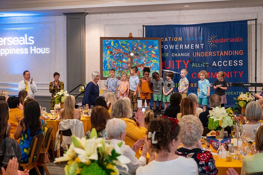 Easterseals preschool students do a recitation for guests.
