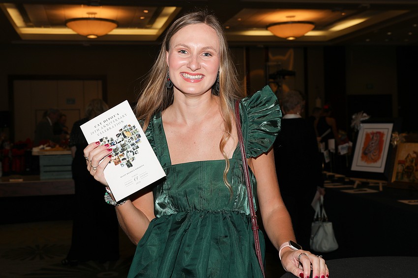 Peyton Davis loves her volunteer work at Cat Depot.